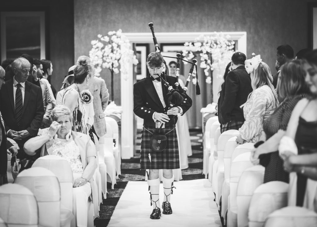 Bag piper entering ceremony at Kingsmills Hotel wedding