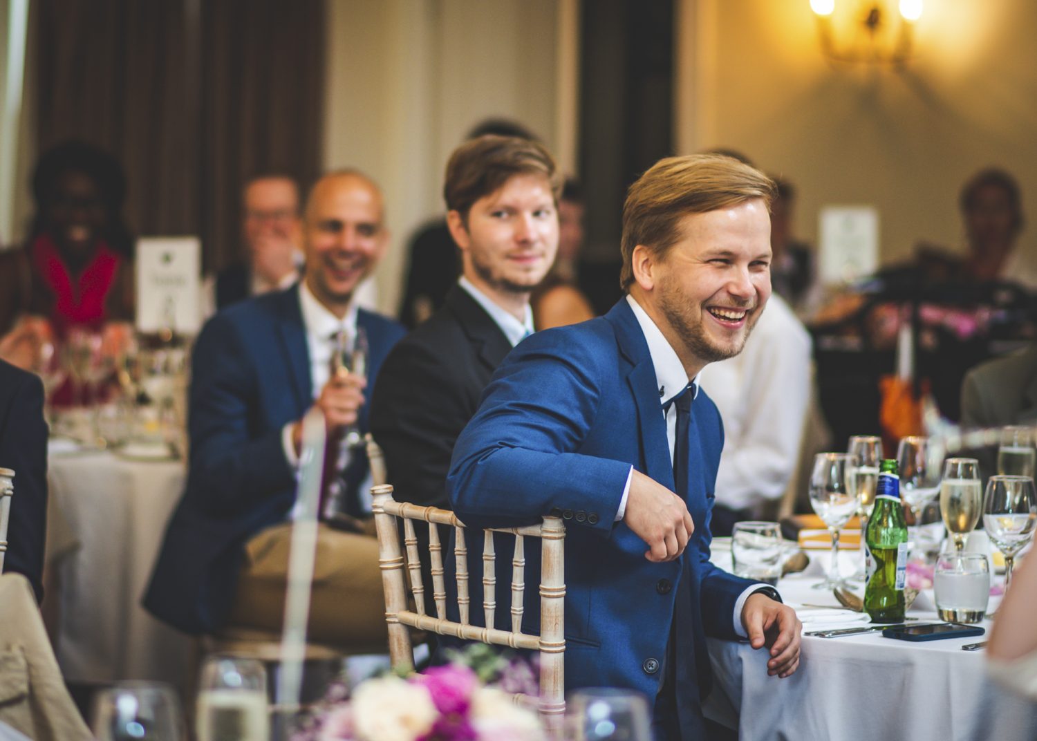 Wedding guest laughing