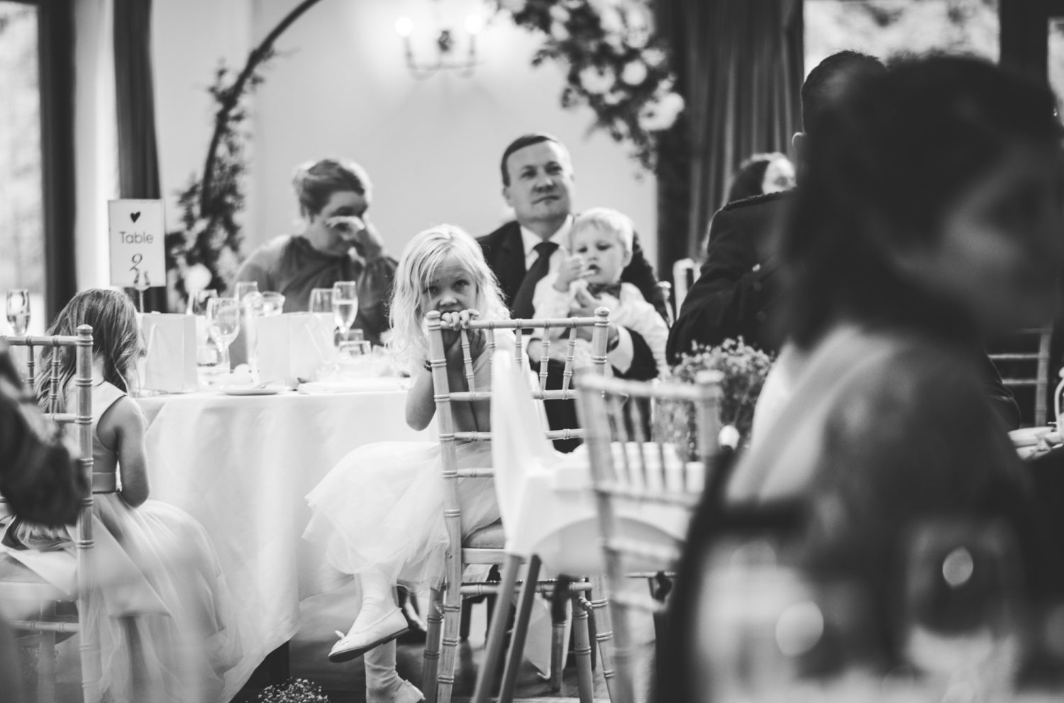 Woman laughing at wedding speech