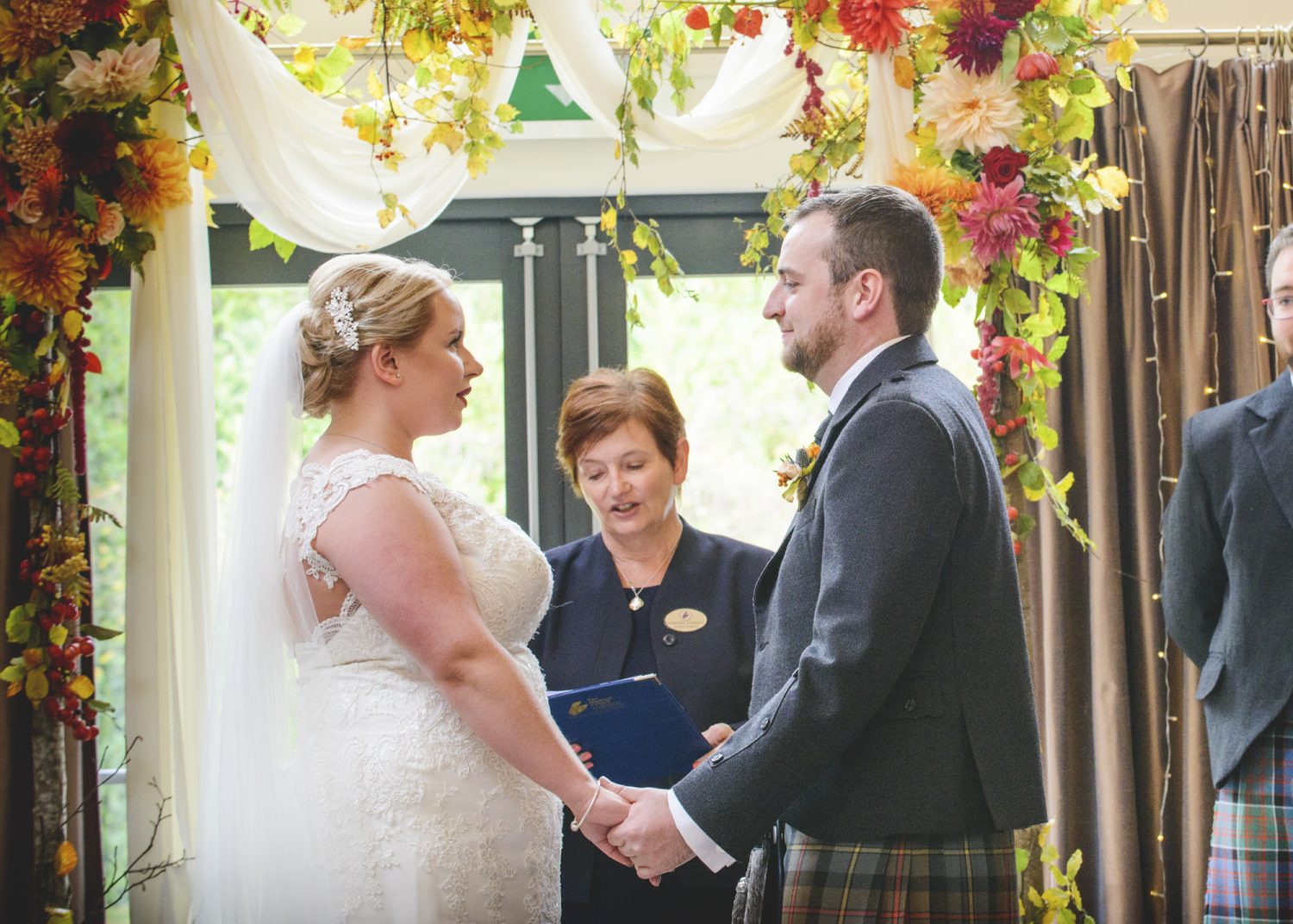 Couple during their wedding ceremony at Loch Ness Country House Hotel