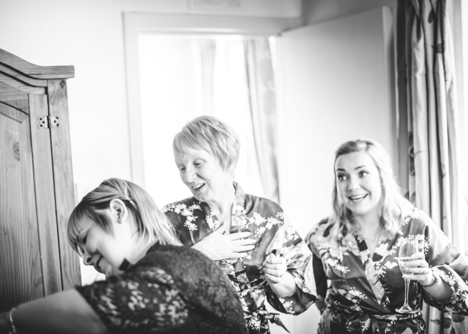 Women having a laugh during preparations