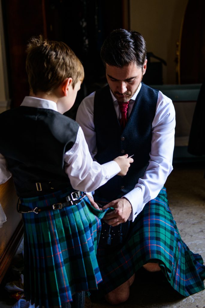 Father and son preparing for the wedding