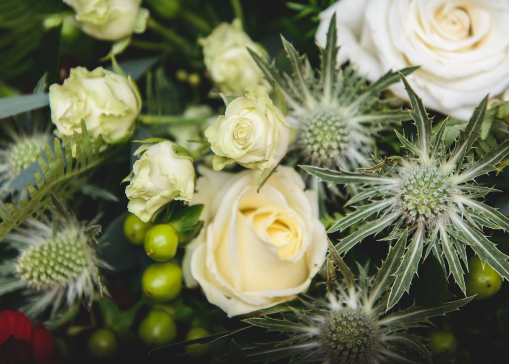 Wedding bouquet with thistles and roses